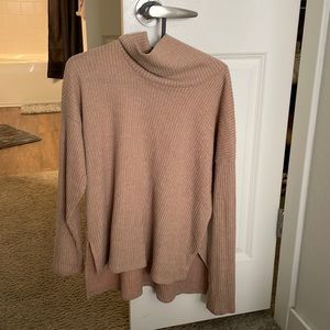 Long knitted dark tan loose turtleneck